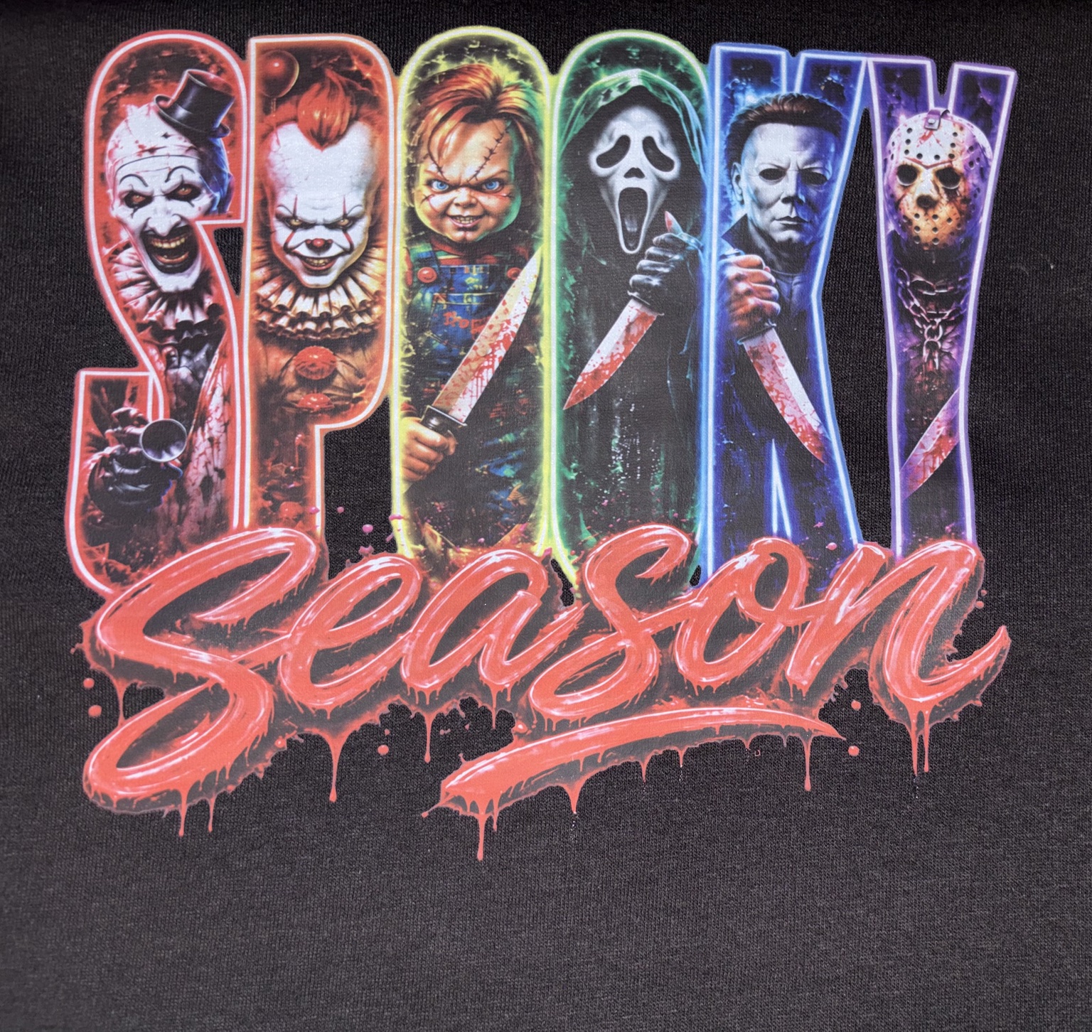Finished black shirt with colorful Spooky Season horror design