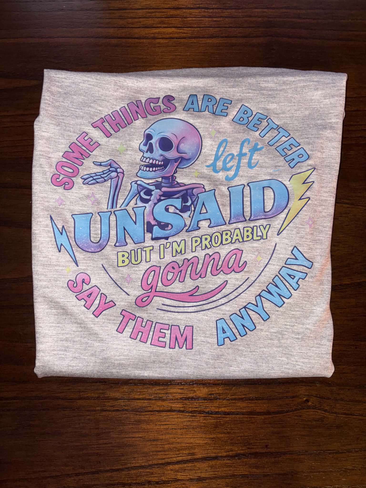 Finished shirt with Some Things Are Better Left Unsaid design